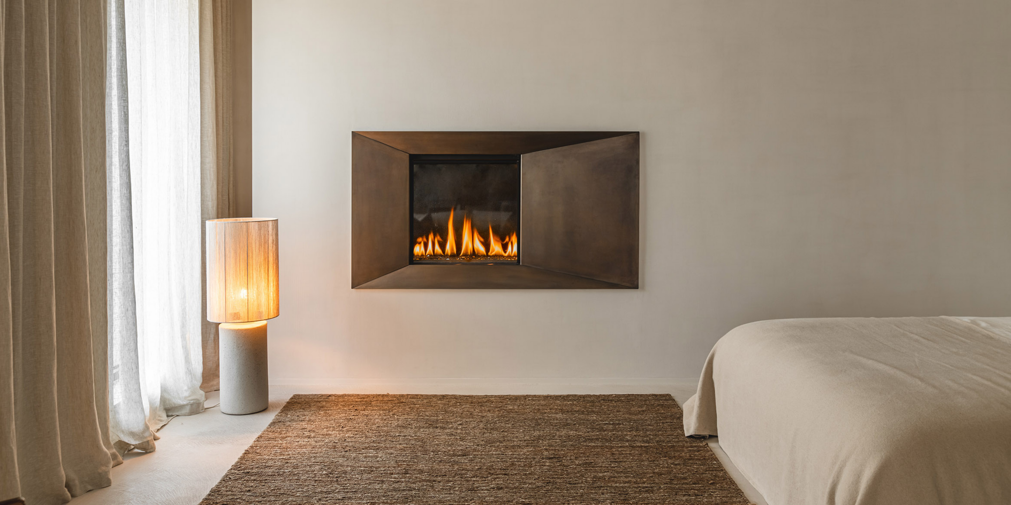 A handmade lamp, which is made with concrete and robes. The lamp creates an ambient warm light.