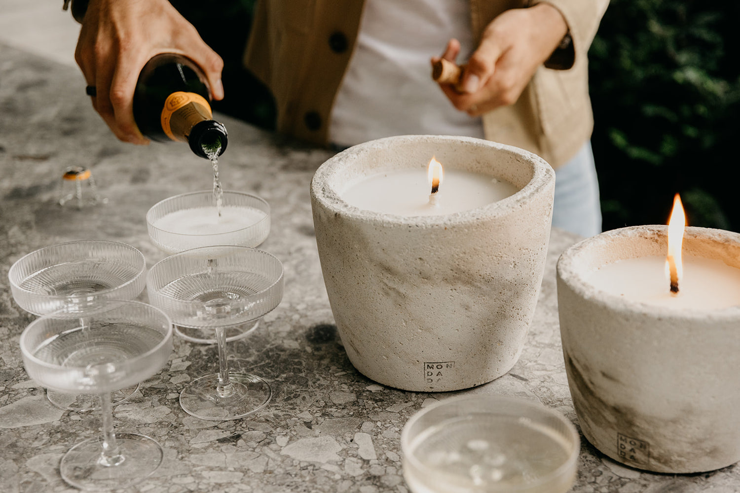 Burning outdoor candles that are handmade in Belgium.
